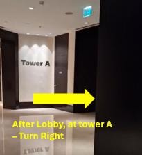 Hotel corridor with Tower A directional signage
