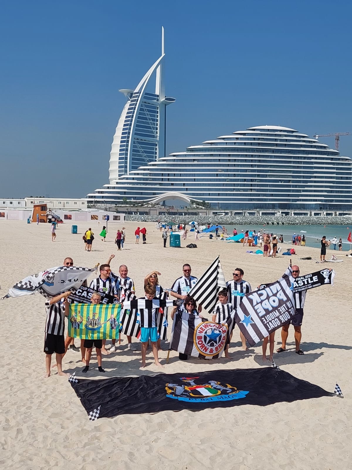Dubai Mags fans on Jumeirah Beach with Burj Al Arab